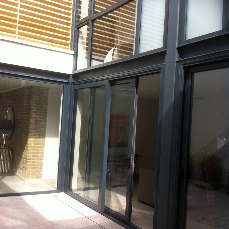 Anthracite aluminium sliding patio doors fitted in Wallington